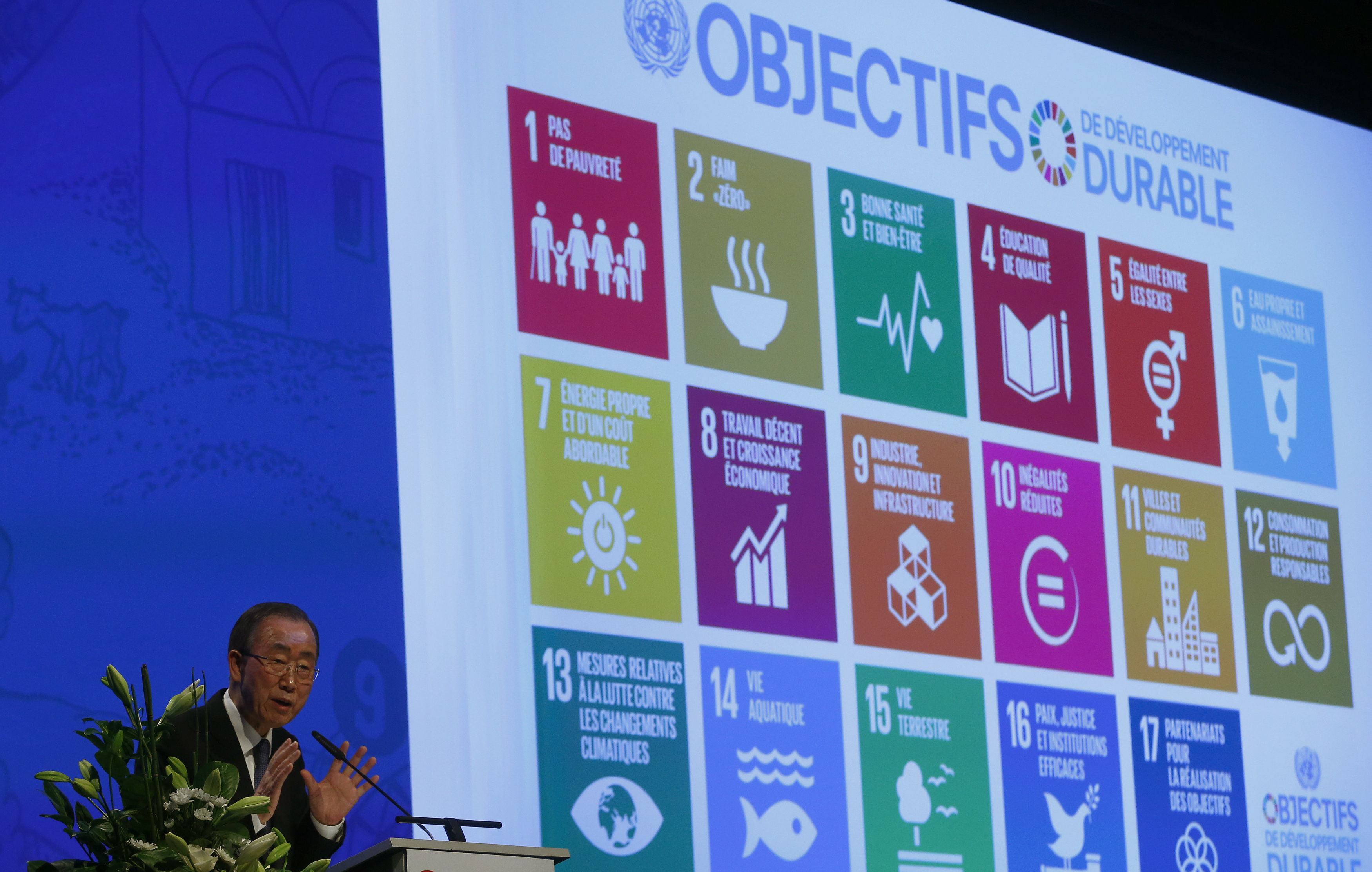 A screen displays the UN's 17 Sustainable Development Goals while the UN Secretary-General speaks into a microphone