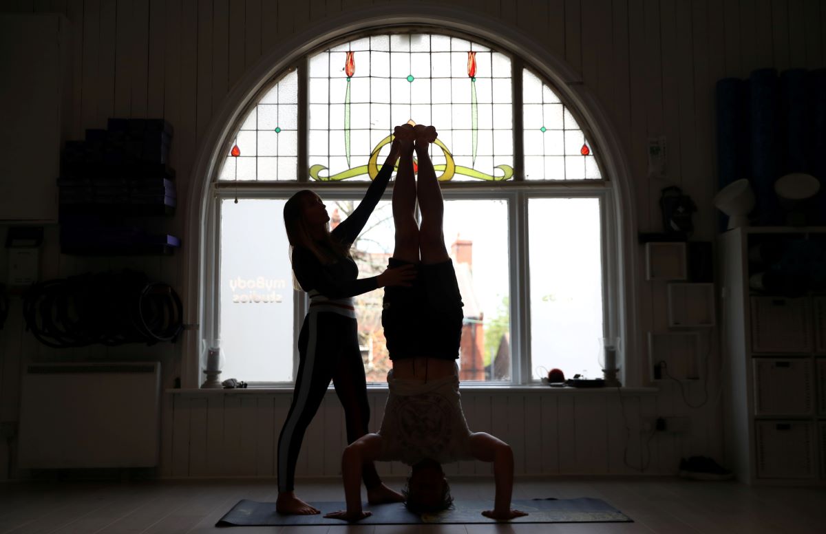 Yoga instructors are seen as they get ready for reopening of MyBody Studios, following the coronavirus disease (COVID-19) outbreak, in East Boldon, near Sunderland Britain July 24, 2020. REUTERS/Lee Smith
