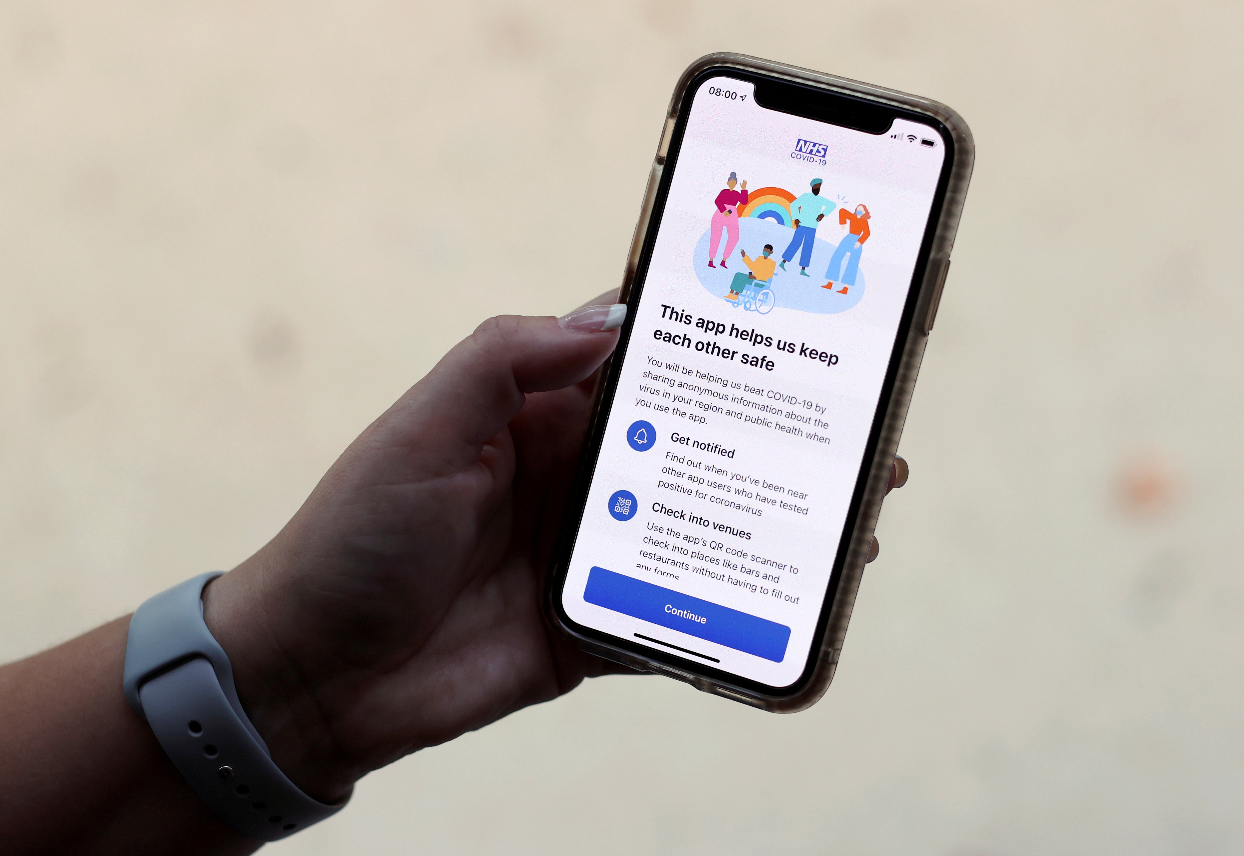 The coronavirus disease (COVID-19) contact tracing smartphone app of Britain's National Health Service (NHS) is displayed on an iPhone in this illustration photograph taken in Keele, Britain, September 24, 2020. REUTERS/Carl Recine/Illustration