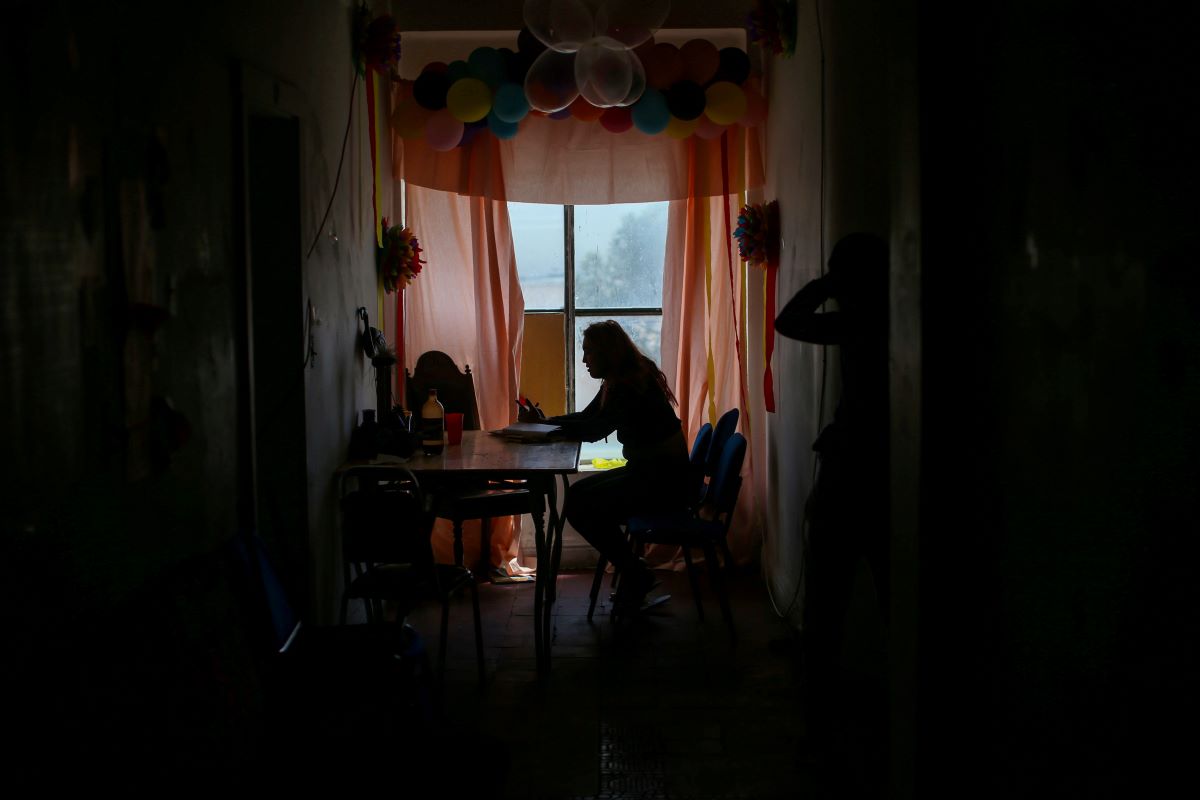 A Central American migrant from the LGBT community is pictured inside an abandoned hotel where she lives temporarily, while expecting to apply for asylum in the U.S., in Ciudad Juarez, Mexico, March 29, 2021. REUTERS/Edgard Garrido