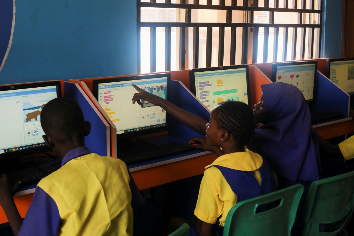 Children attend a computer class in the area of Kuje, in Abuja, Nigeria February 18, 2022