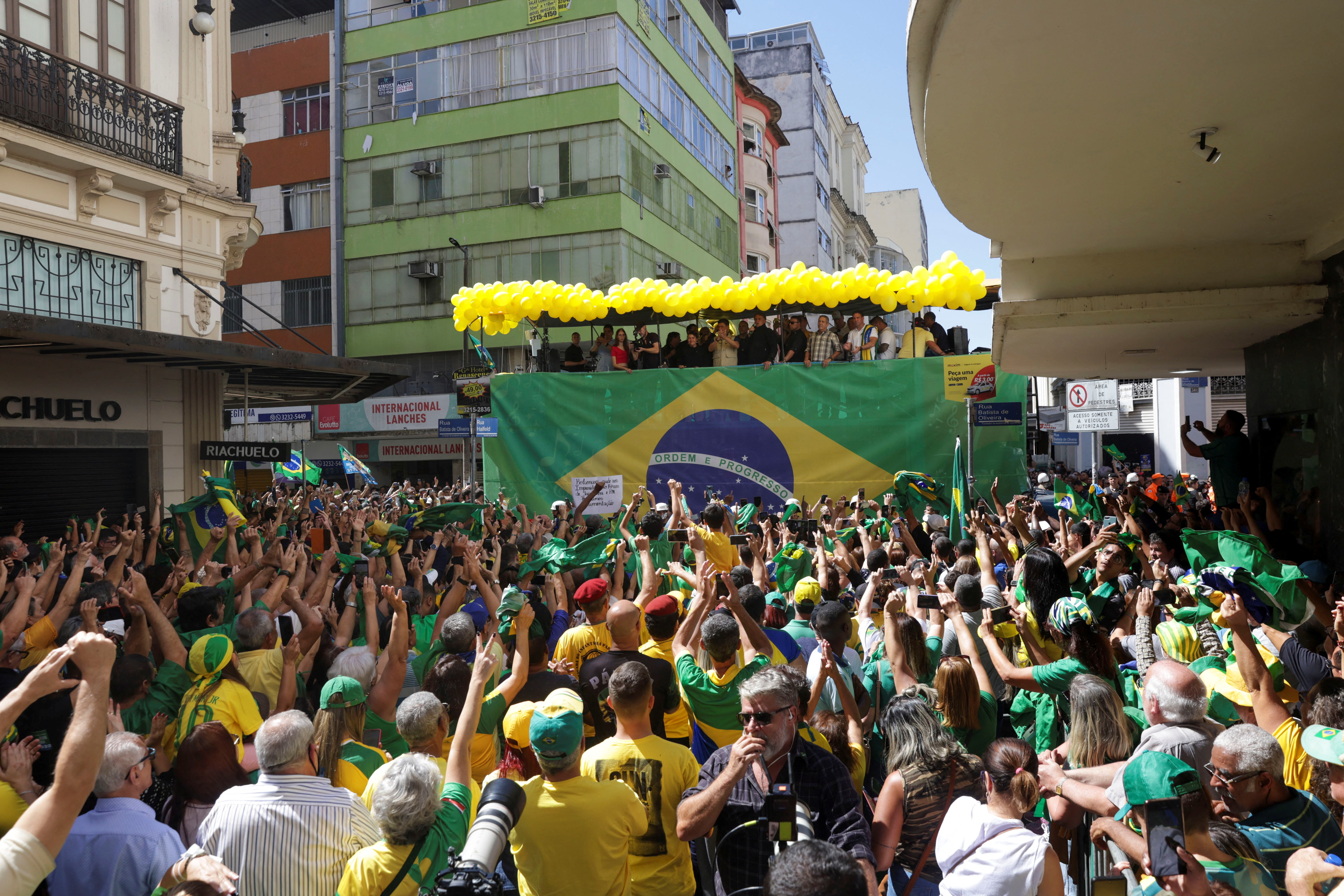 Supporters attend a campaign rally of Brazil's President and candidate for re-election Jair Bolsonaro, in Juiz de Fora, Brazil August 16, 2022