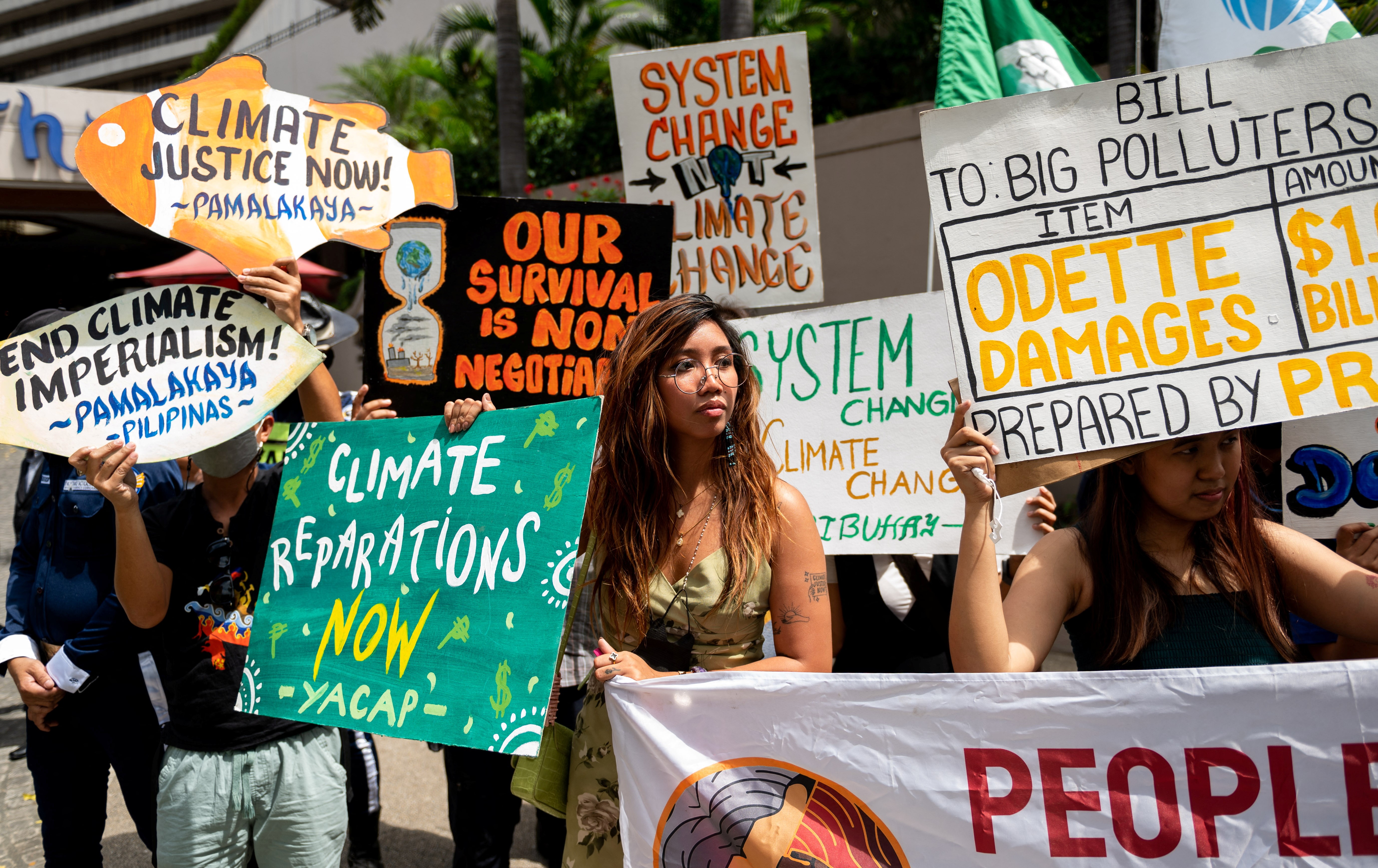 Climate activists demanding climate reparations hold a protest during the 18th meeting of the Executive Committee of the Warsaw International Mechanism for Loss and Damage, Metro Manila, Philippines, February 28, 2023. REUTERS/Lisa Marie David