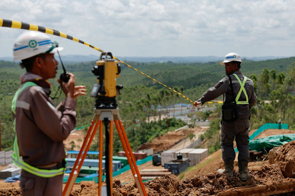 Workers are seen at the core goverment area construction of Indonesia's new capital, known as Nusantara National Capital (IKN), in Sepaku, East Kalimantan province, Indonesia, March 8, 2023. REUTERS/Willy Kurniawan