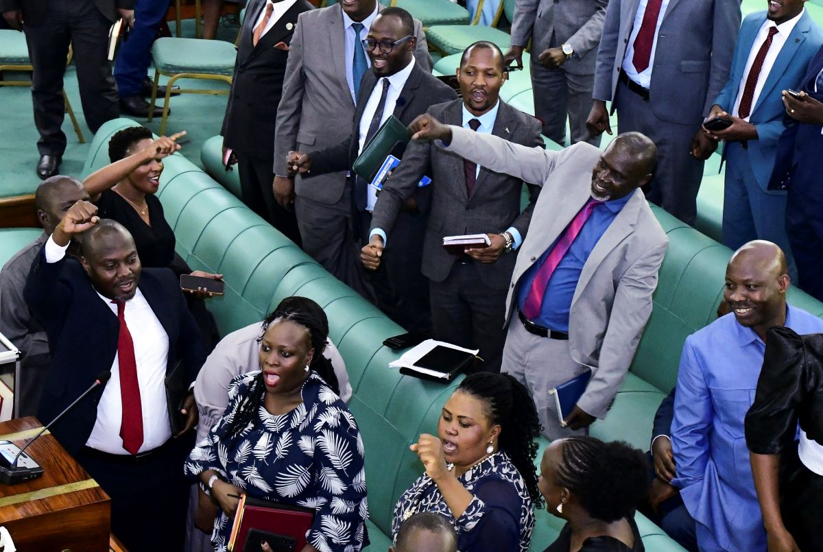 Ugandan Members of Parliament celebrate after passing the anti-Homosexuality bill, during a sitting inside the Parliament Buildings, in Kampala, Uganda May 2, 2023