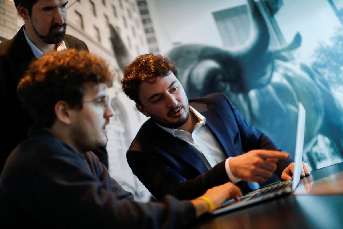 Agustin Romo, 27, a legislative candidate for Buenos Aires province, who informally coordinates the social media team of Javier Milei's La Libertad Avanza party, works at the party's office, in Buenos Aires, Argentina August 25, 2023. REUTERS/Agustin Marcarian