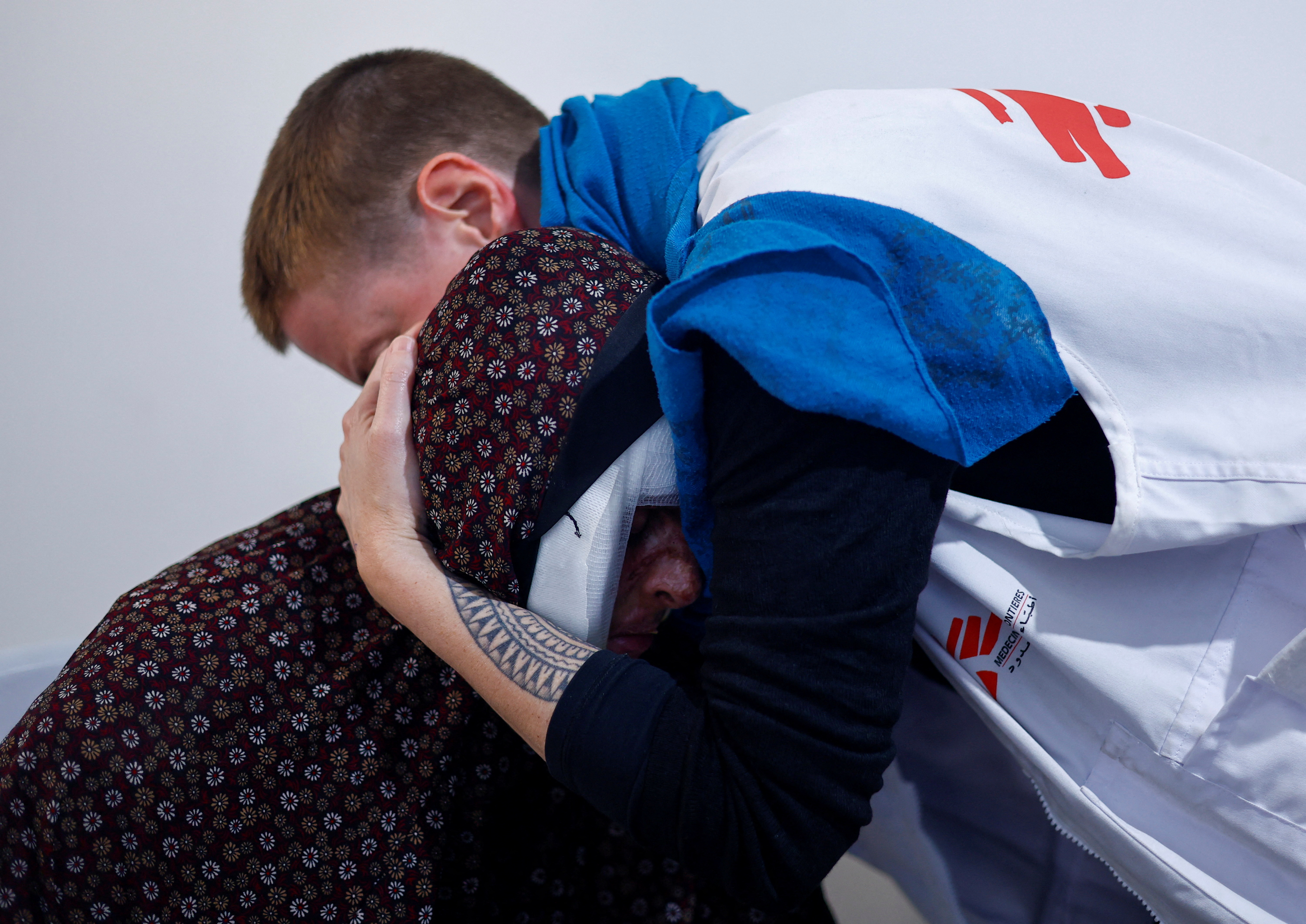A Palestinian woman receives treatment provided by Doctors Without Borders, at a hospital in Rafah in the southern Gaza Strip, March 20, 2024. REUTERS/Mohammed Salem