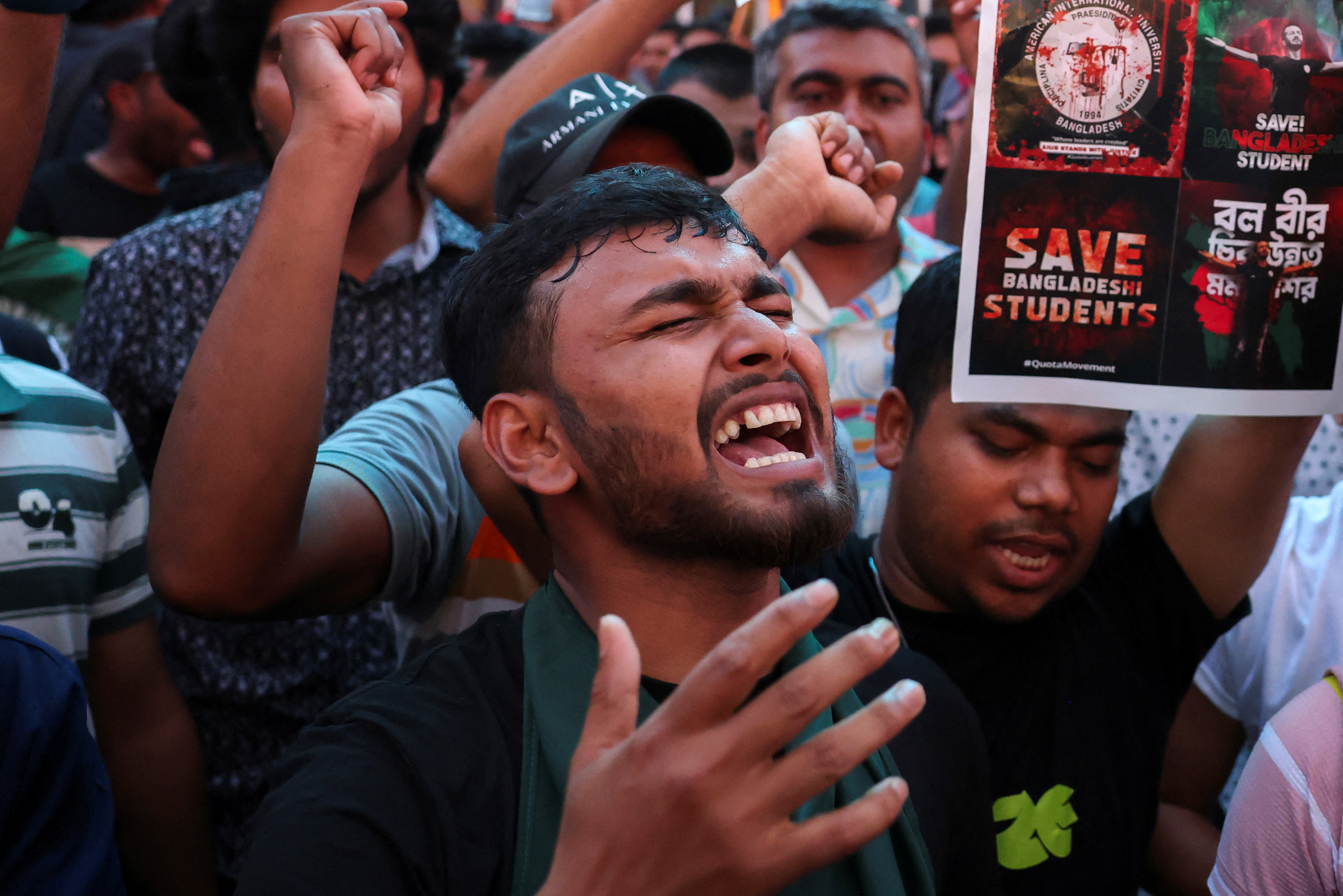 Protesters against quotas for government jobs in Bangladesh demonstrate in Times Square in New York City, U.S., July 18, 2024. REUTERS/Kent J. Edwards