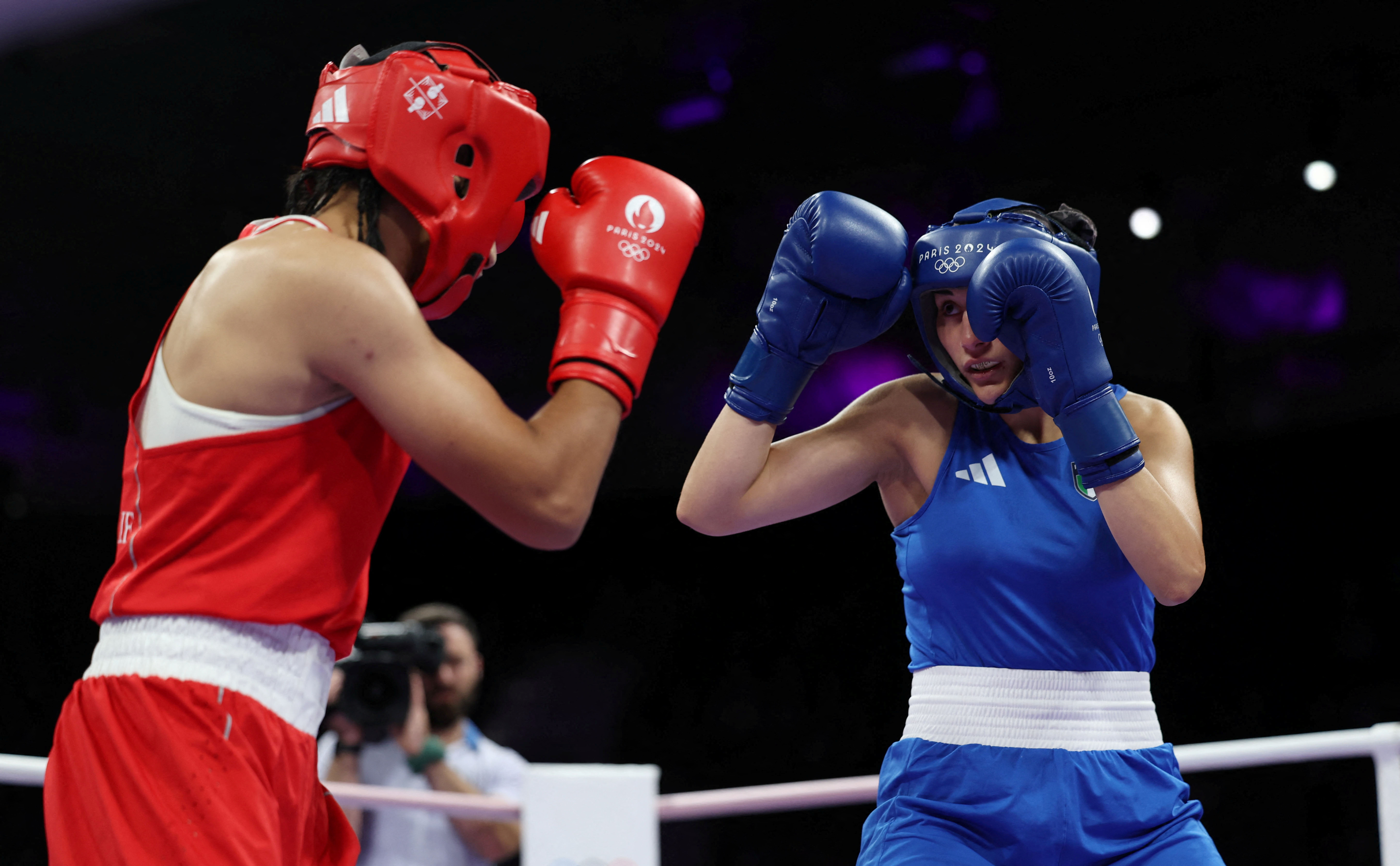 Imane Khelif of Algeria and Angela Carini of Italy in action during the women's 66kg boxing at the Paris 2024 Olympics in Villepinte, France, August 1, 2024. REUTERS/Isabel Infantes
