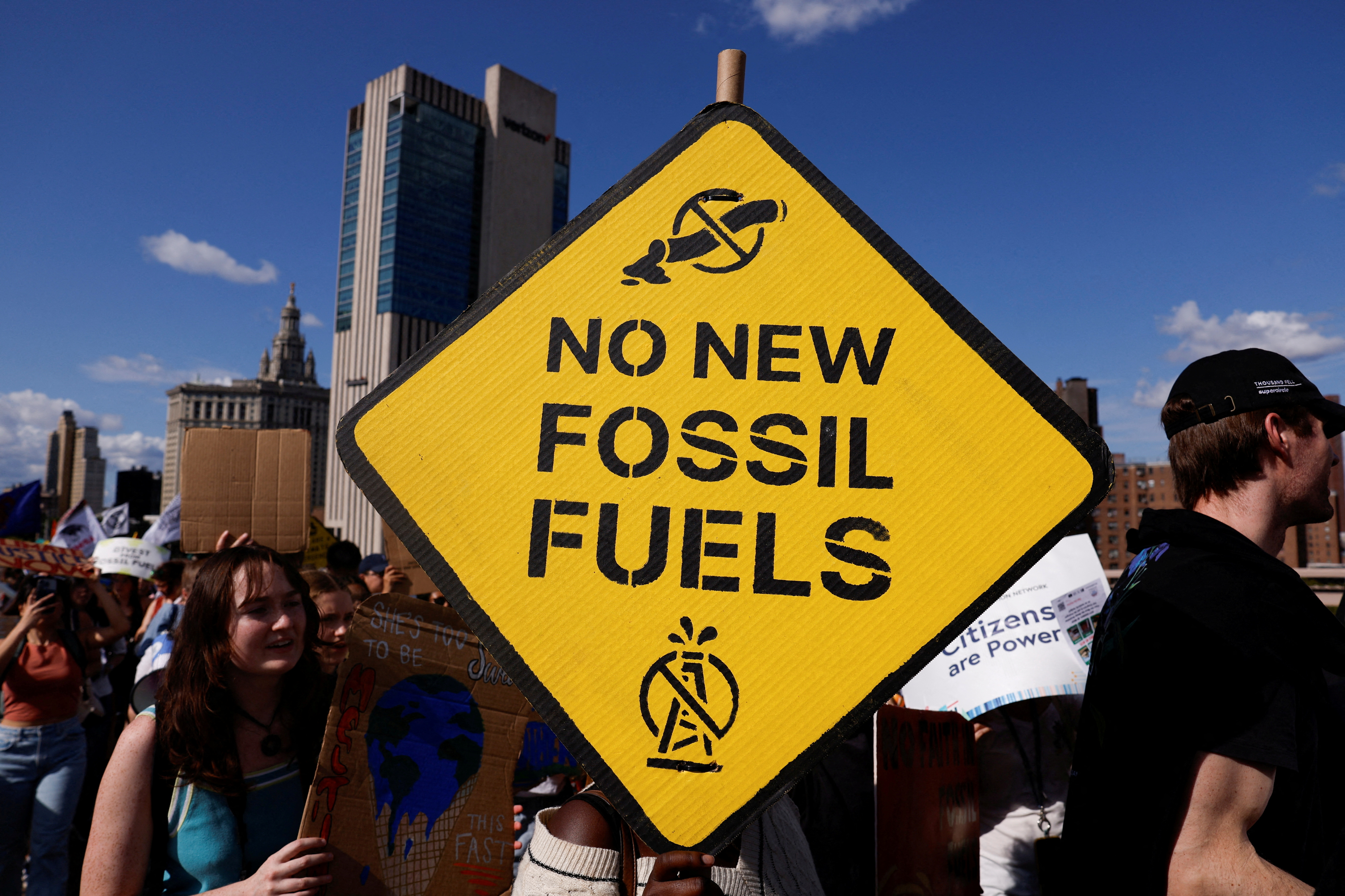 Demonstrators take part in rally calling to an end to the era of fossil fuels, as part of global day of action on 9/20 calling on Polluters, Funders, and Leaders to ditch fossil fuels, from Foley Square in New York City, U.S. September 20, 2024. REUTERS/Shannon Stapleton