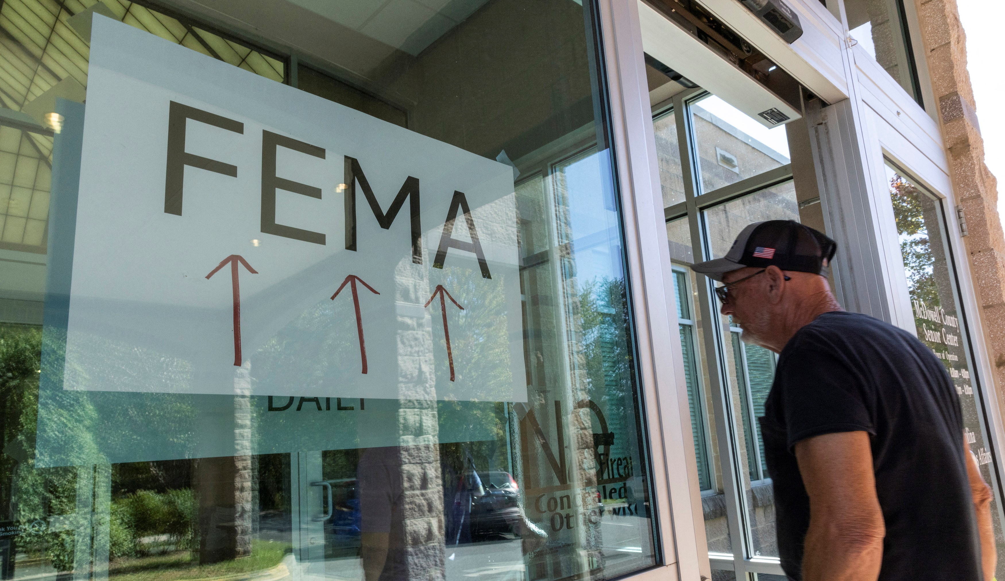 A resident enters a FEMA's improvised station to attend claims by local residents affected by floods following the passing of Hurricane Helene, in Marion, North Carolina, U.S., October 5, 2024. REUTERS/Eduardo Munoz