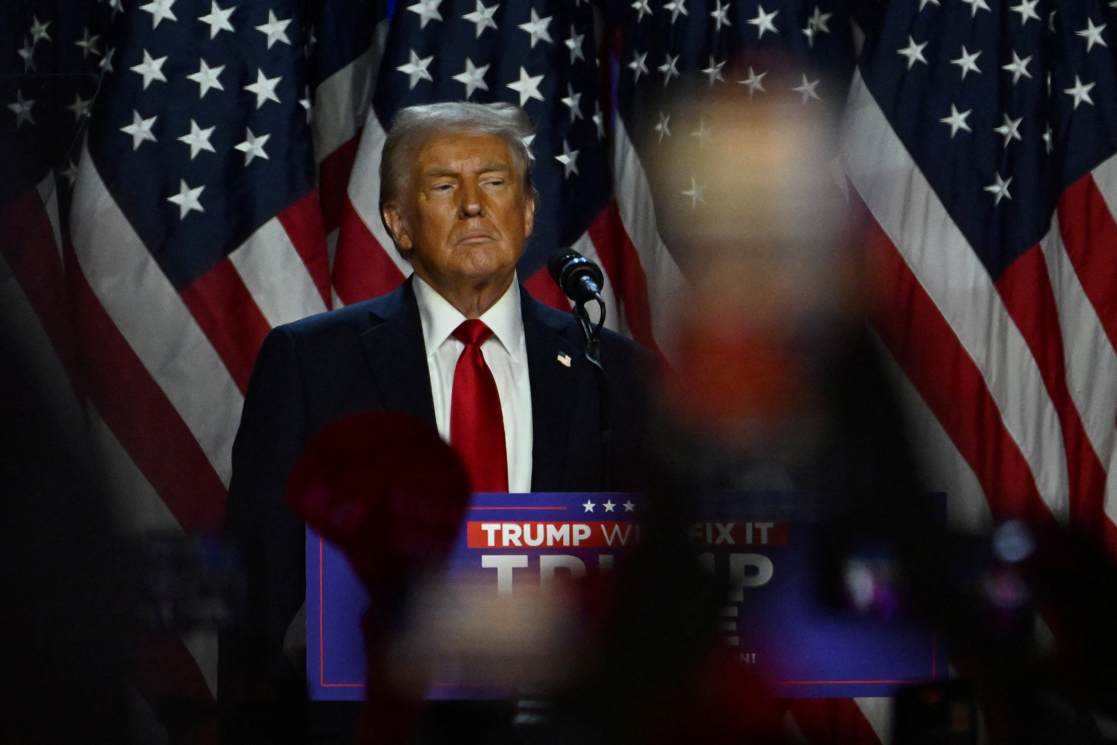 Republican presidential nominee Donald Trump takes the stage following early results from the 2024 U.S. presidential election in West Palm Beach, Florida, U.S., November 6, 2024. REUTERS/Callaghan O'Hare