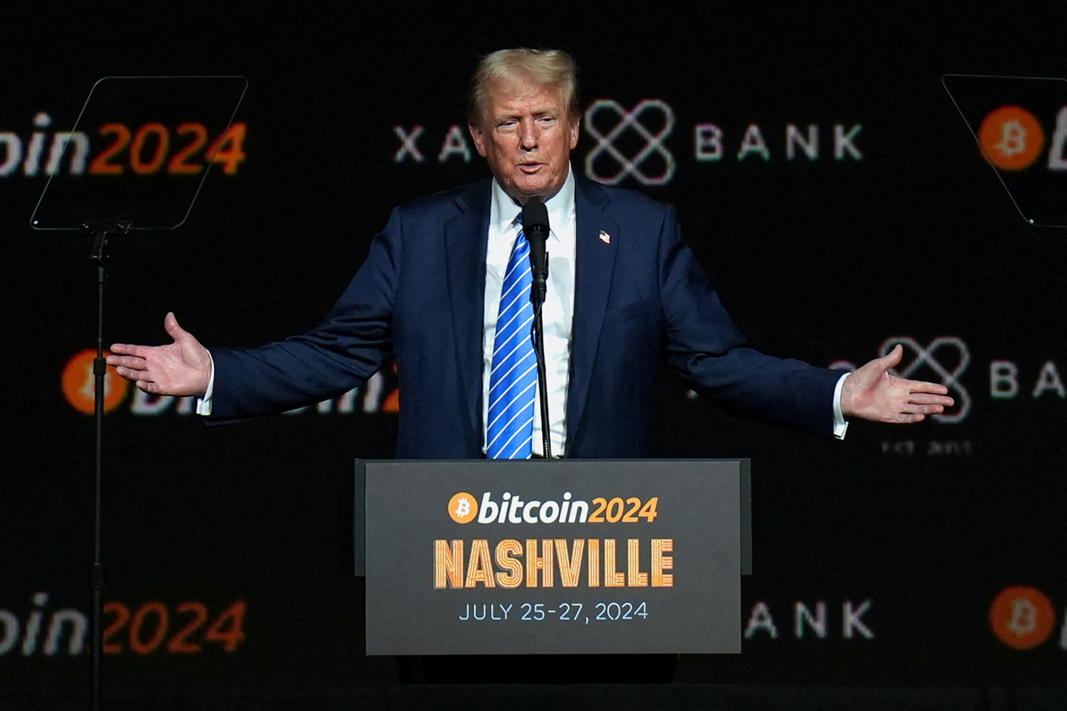 Republican presidential nominee and former U.S. President Donald Trump gestures at the Bitcoin 2024 event in Nashville, Tennessee, U.S., July 27, 2024. REUTERS/Kevin Wurm