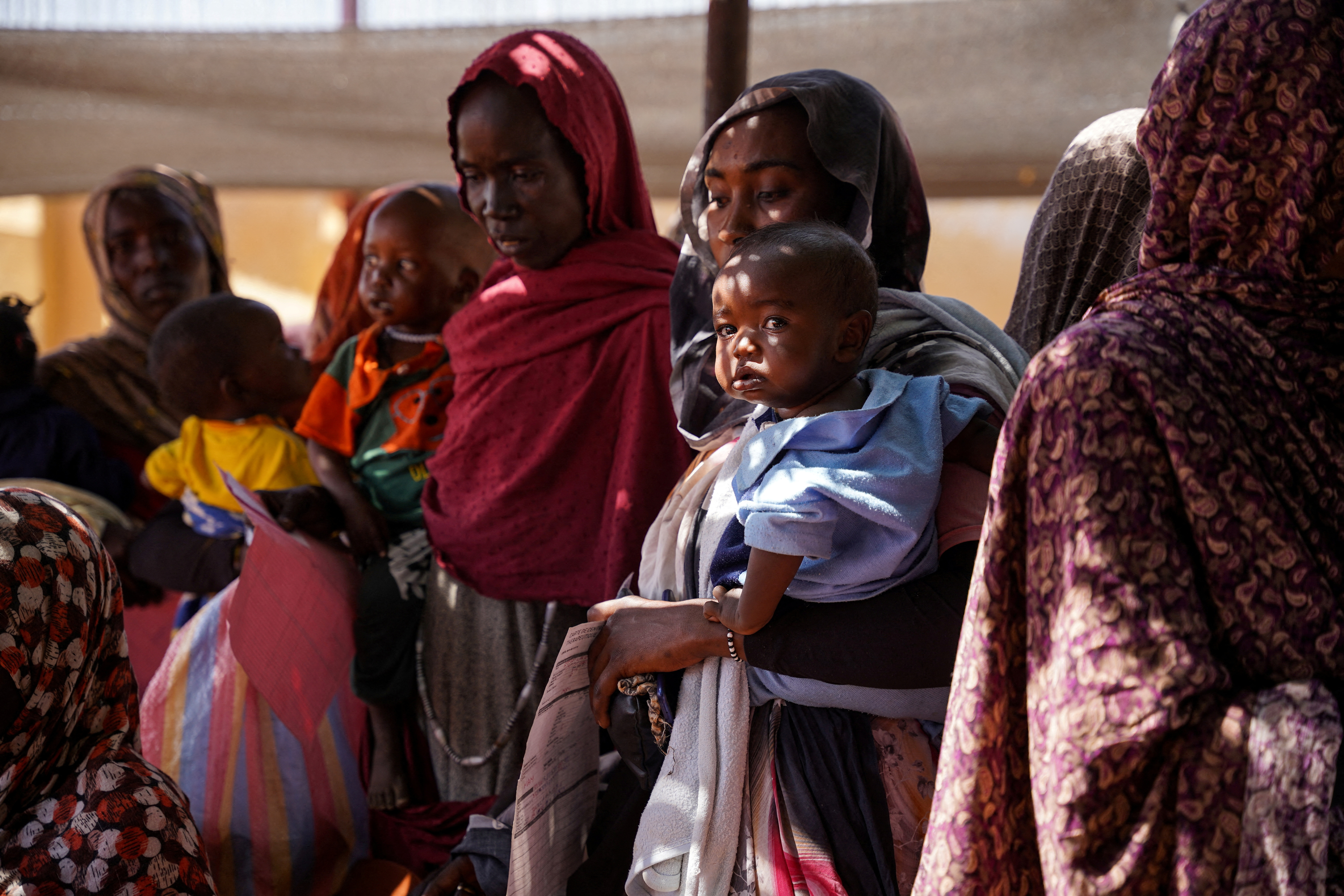 Women and babies at the Zamzam displacement camp, close to al-Fashir in North Darfur, Sudan. January 2024. MSF/Mohamed Zakaria/Handout via REUTERS