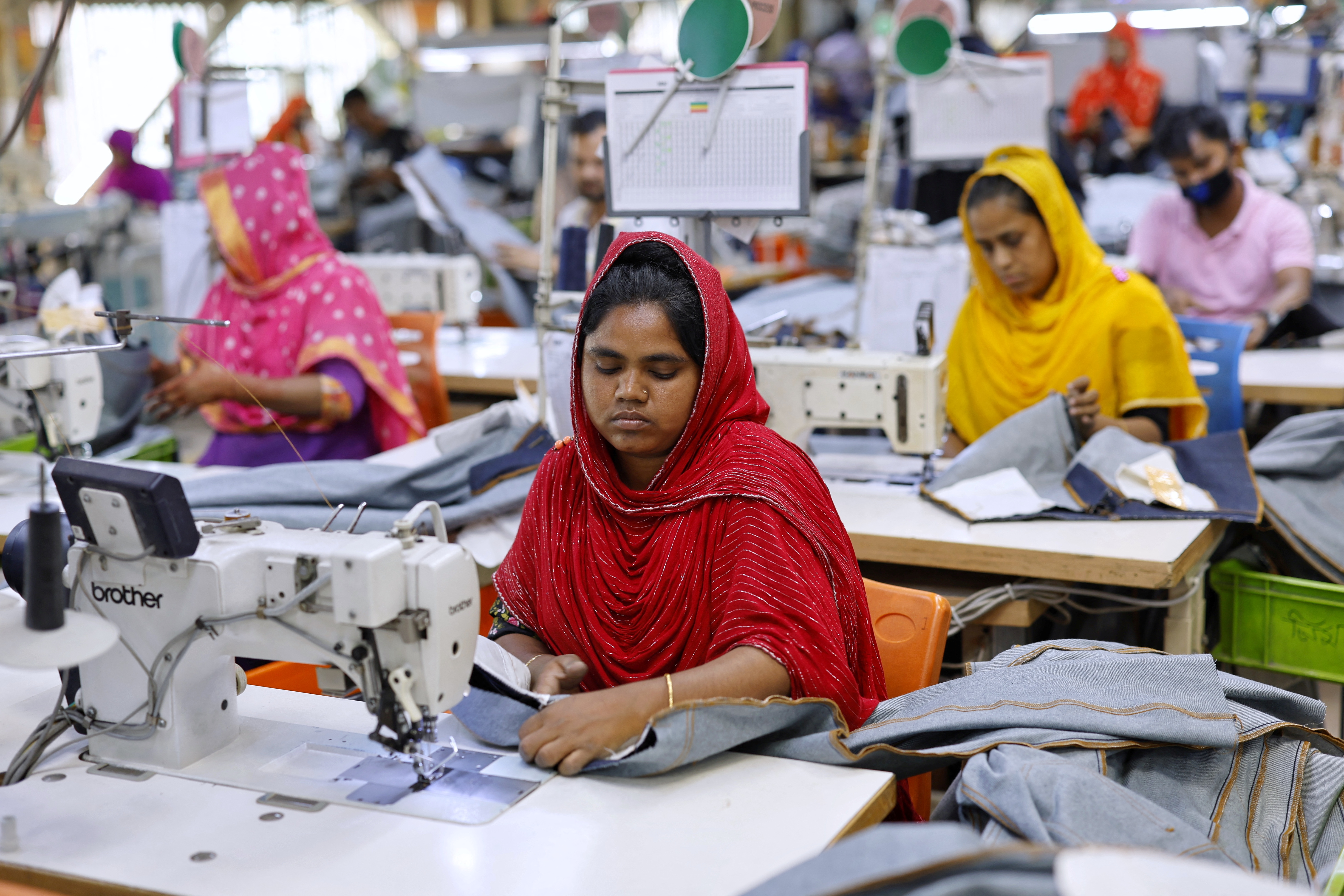 Bangladeshi garment workers make clothing in the sewing section of a factory in Gazipur, Bangladesh, April 9, 2025. REUTERS/Mohammad Ponir Hossain