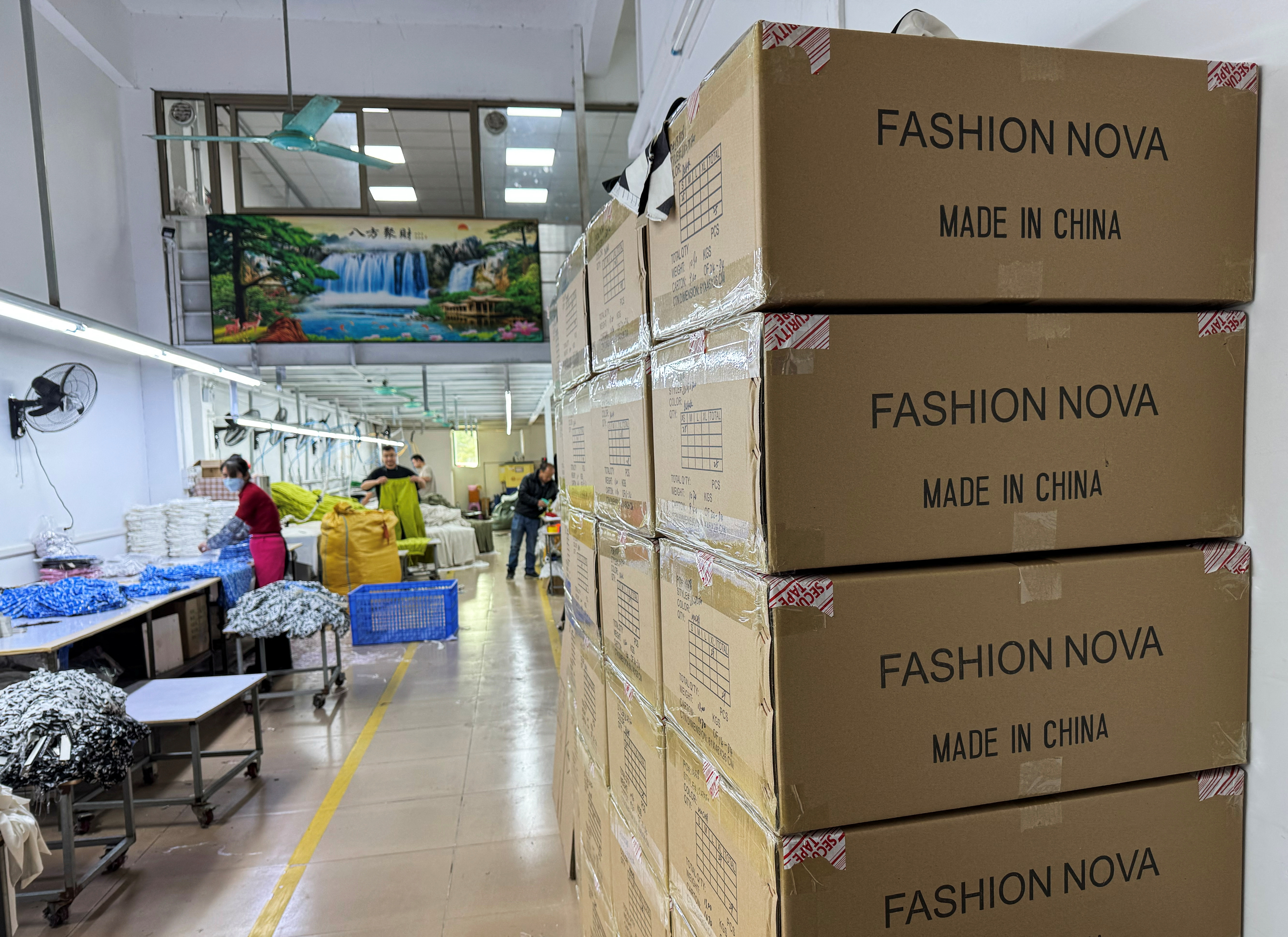 Boxes of clothing for export are pictured at a clothing factory in Guangzhou, Guangdong province, China April 1, 2025. REUTERS/Sophie Yu