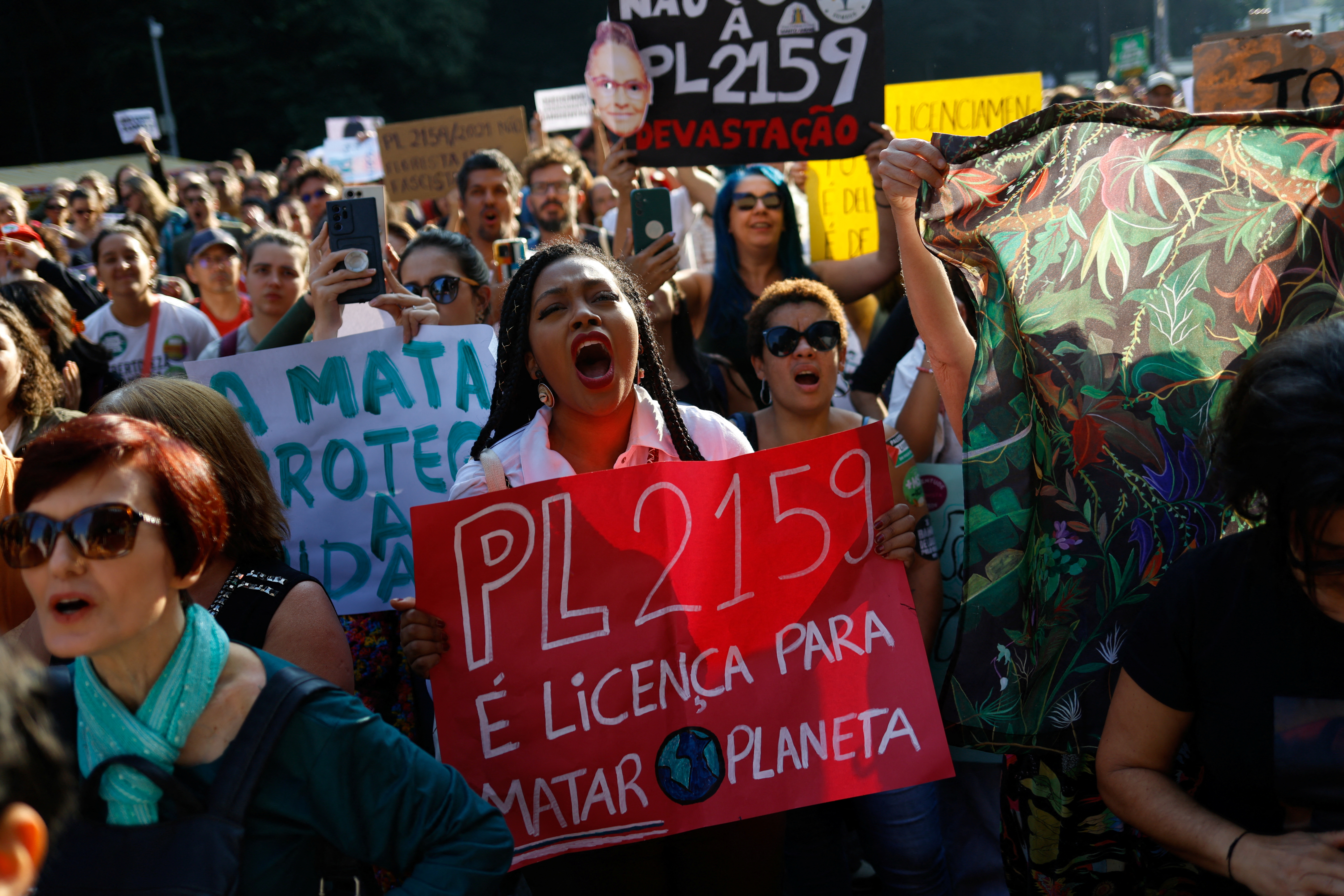 Environmental activist rally against a bill known as the 'devastation bill' after the Senate approved the project that creates the General Environmental Licensing Law (PL 2159/2021), which relaxes the requirements for companies that exploit environmental resources and threatens protected biomes in Sao Paulo, Brazil, June 1, 2025. REUTERS/Tuane Fernandes