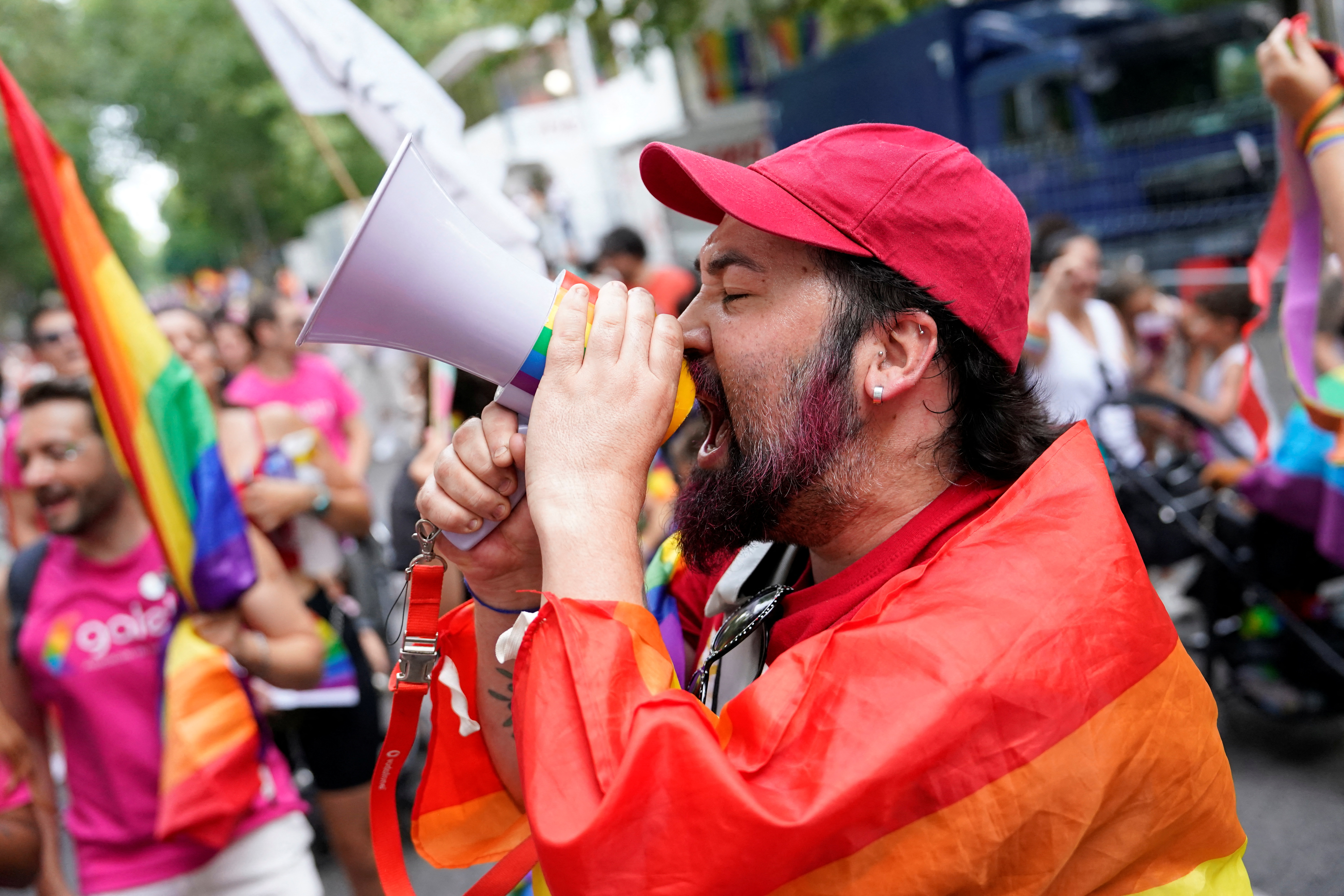 A person uses a megaphone during the annual LGBT Pride Parade in Madrid, Spain, July 5, 2025. REUTERS/Ana Beltran