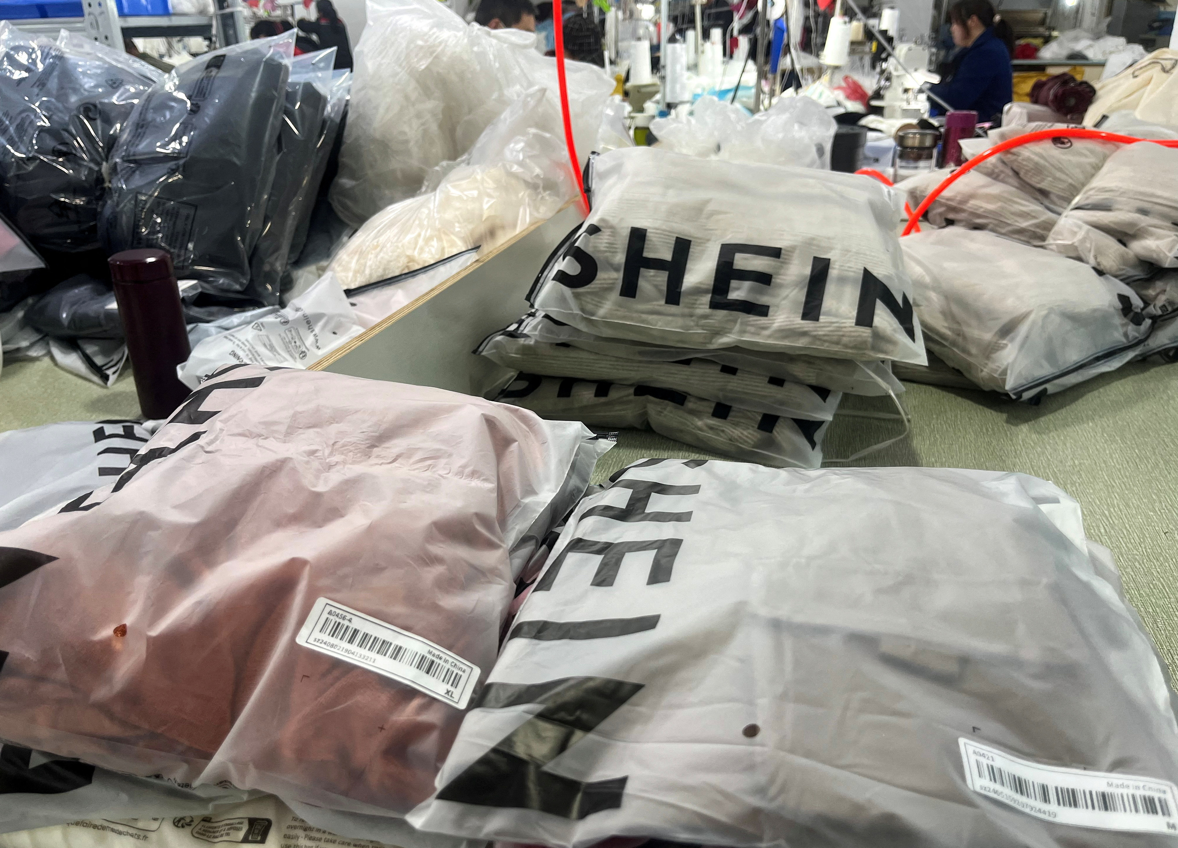 Packs of clothing are pictured at a garment factory for Shein in Guangzhou, Guangdong province, China April 1, 2025. REUTERS/Casey Hall
