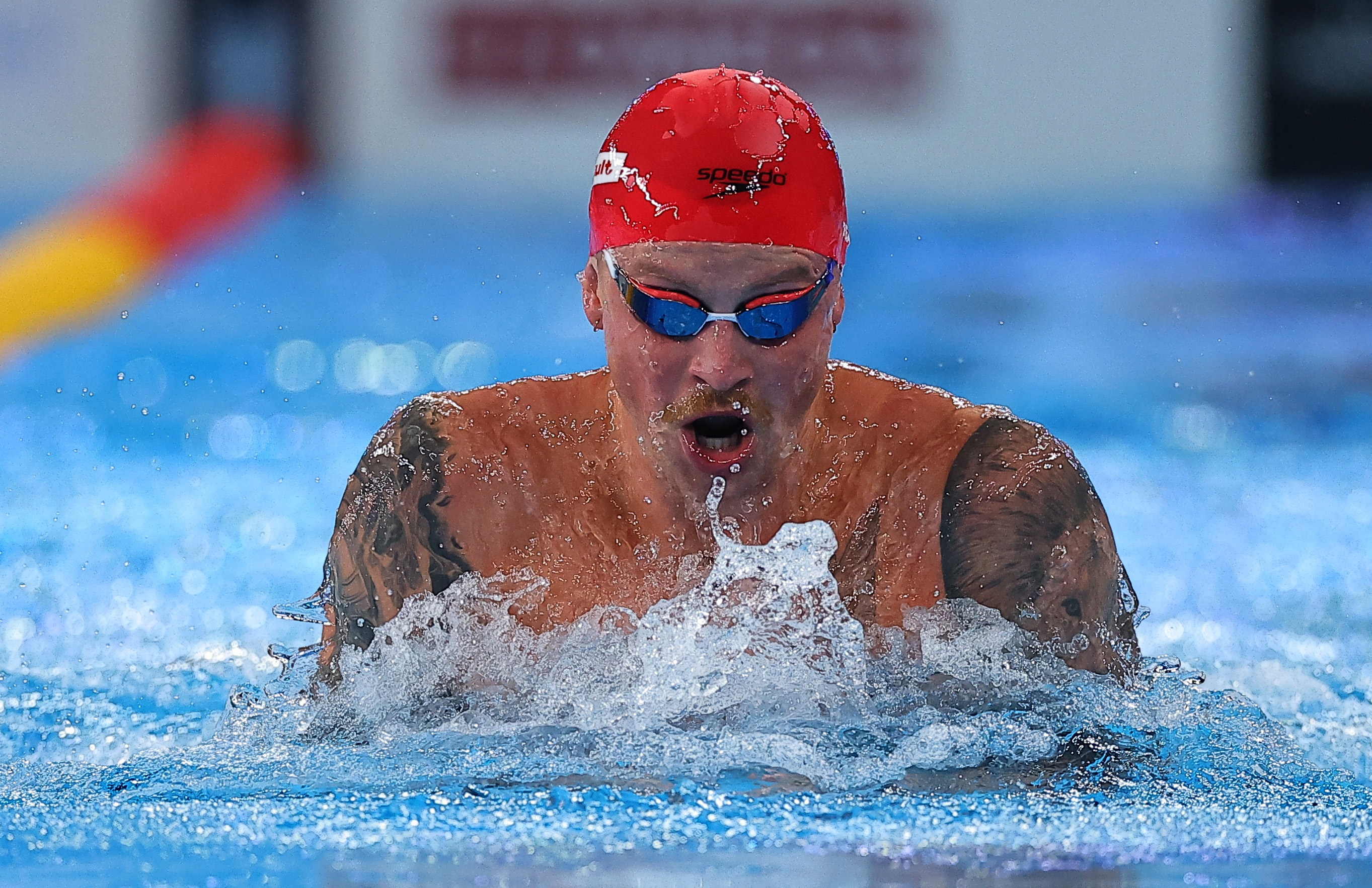 Britain's Adam Peaty - coached by Melanie Marshall - competes at the World Aquatics Championships in Doha, Qatar, February 2024 REUTERS/Evgenia Novozhenina