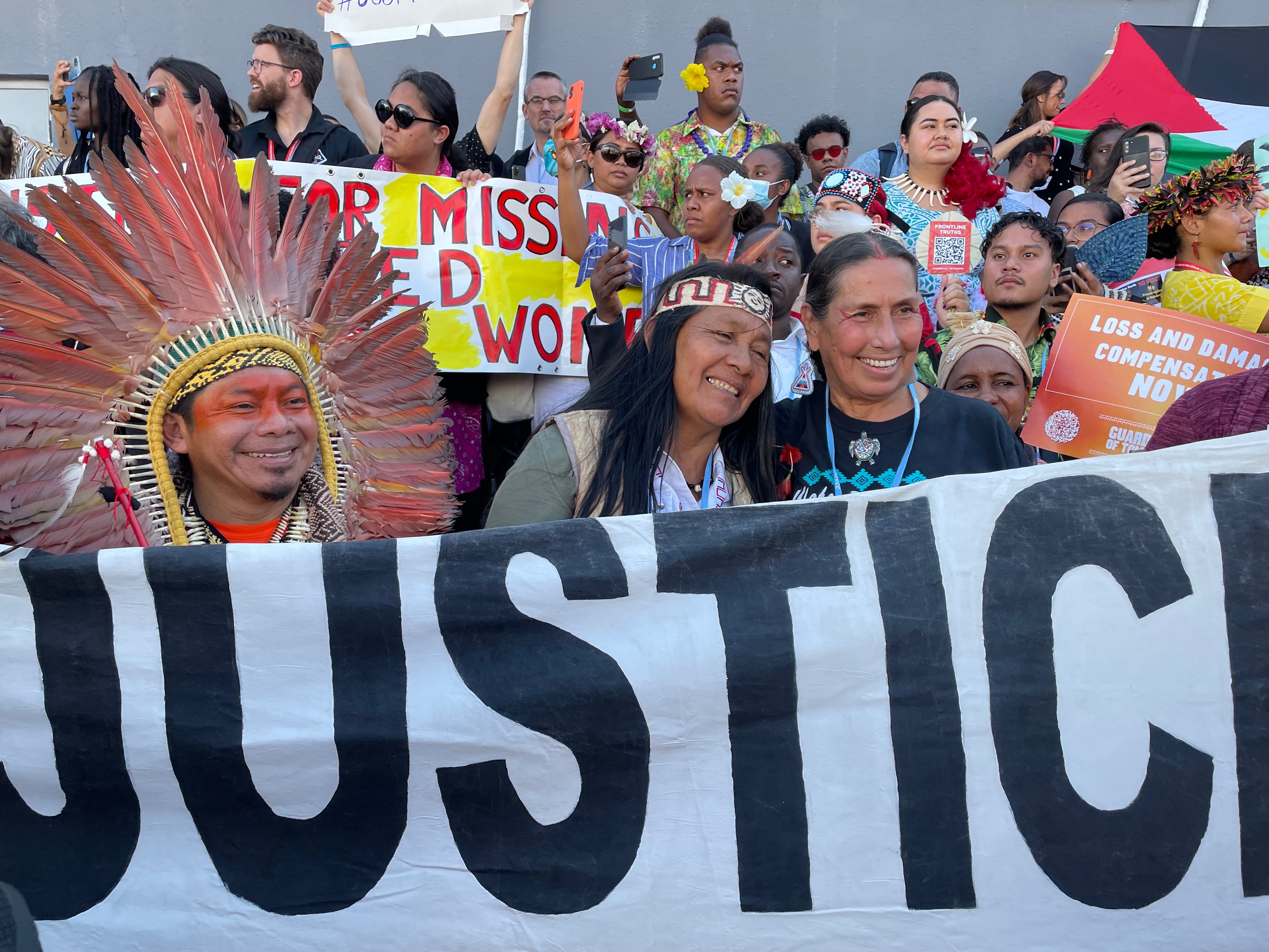 Green groups and activists take part in a march to demand climate justice and reparations for climate-induced loss and damage inside the COP27 climate summit in Sharm el-Sheikh, Egypt, on Nov. 12, 2022. Thomson Reuters Foundation/Megan Rowling