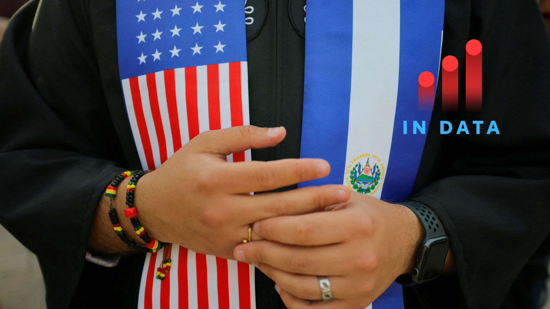 A person wears a stole with the flags of U.S. and El Salvador as members of the Harvard community take part in a "Harvard Stand United" rally to "support and celebrate" the school's international students at Harvard University in Cambridge, Massachusetts, U.S., May 27, 2025. REUTERS/Brian Snyder