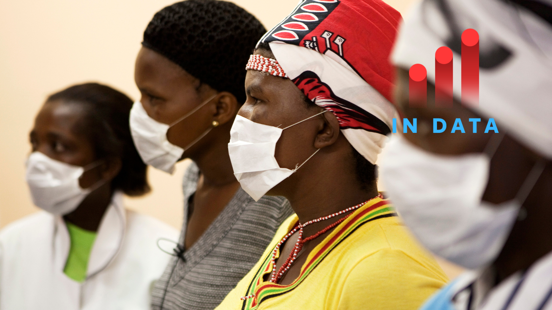 Patients with HIV and tuberculosis (TB) wear masks while awaiting consultation at a clinic in Cape Town's Khayelitsha township, February 23, 2010. REUTERS/Finbarr O'Reilly