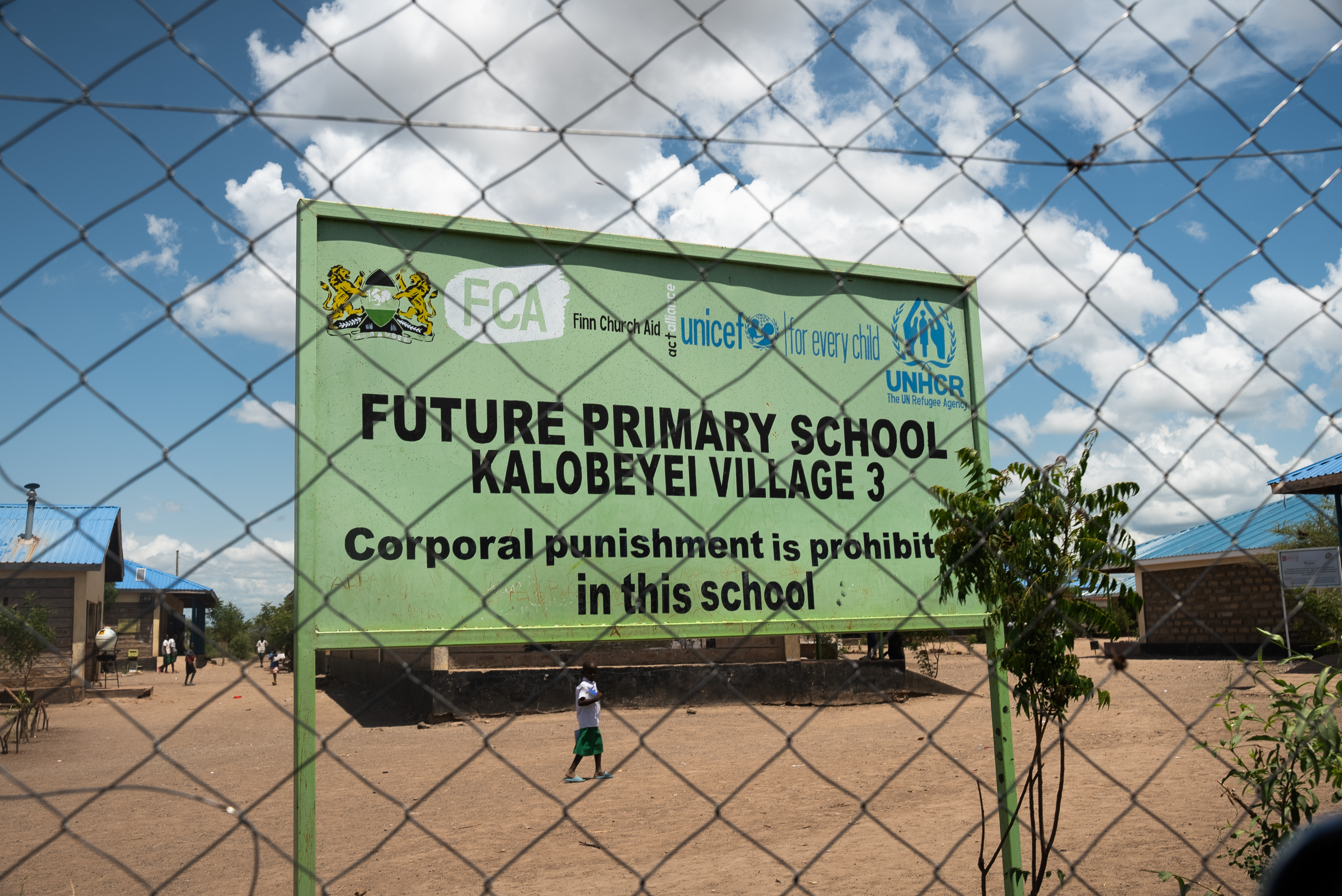 A pupil walks in the yard of the Future Primary School in the Kakuma Refugee Camp in northern Kenya, May 21, 2025. Thomson Reuters Foundation/Farai Shawn Matiashe