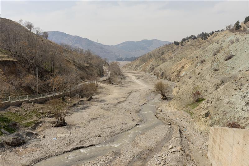 The Jajrood River that runs to the Latian Dam is dried up as Iran faces extreme drought, Lavasan, Iran, March 18, 2025. Middle East Images/handout via Thomson Reuters Foundation.