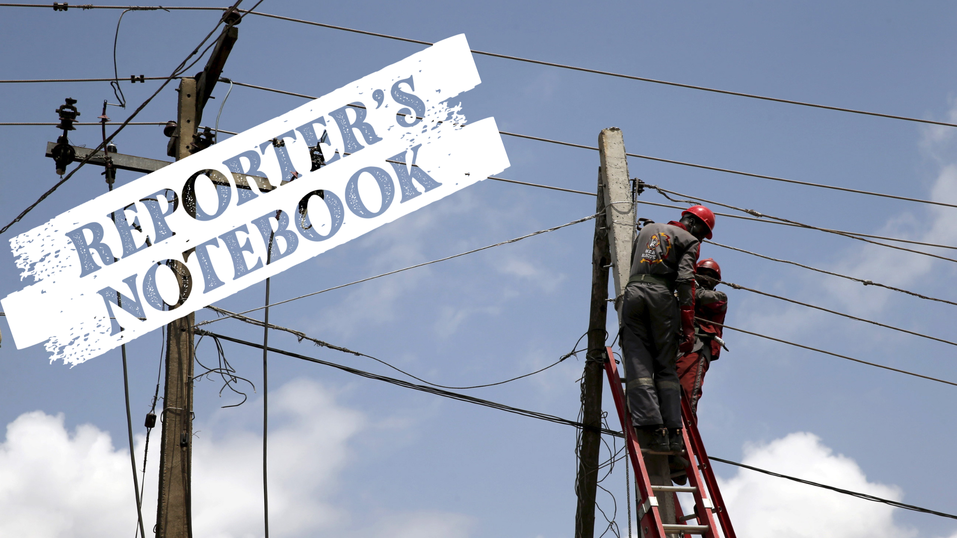 Power officials stand on ladders to fix electric cables along a road in Egbeda dstrict in Nigeria's commercial capital Lagos, July 1, 2015. REUTERS/Akintunde Akinleye